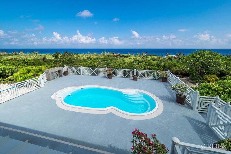 CAYMAN BRAC GUEST HOUSE WITH BEACH LOT!